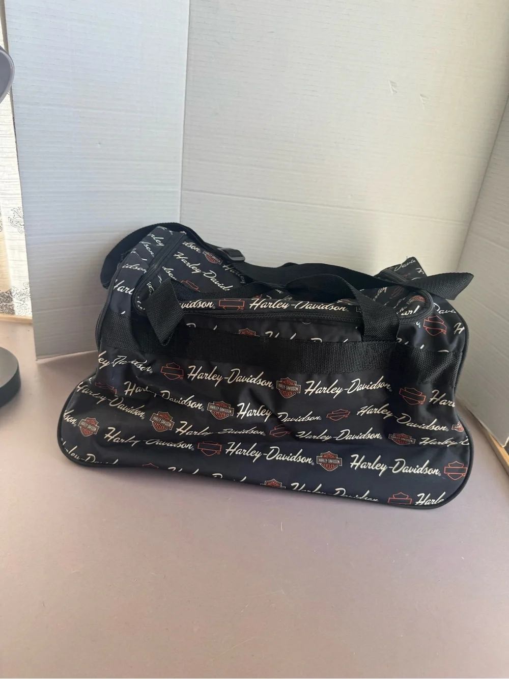Harley-Davidson Black Duffel with White Script and Orange Accents